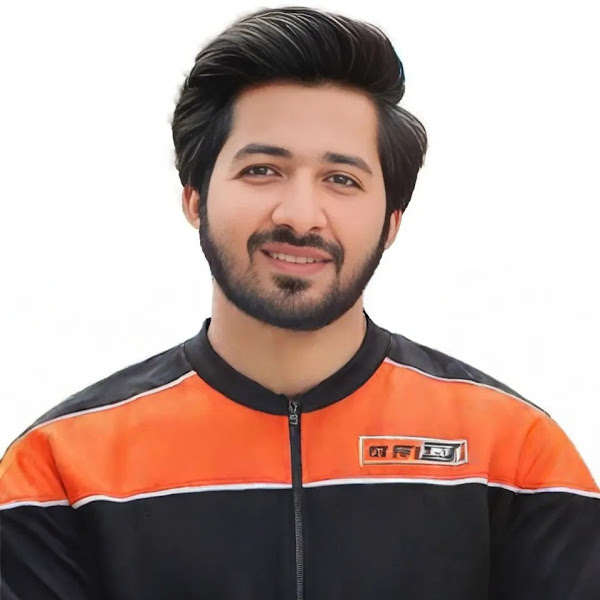 A professional portrait of Haider Ali